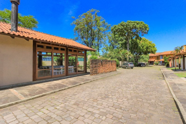 Imagem Casa com 4 Quartos à Venda, 117 m² em Cavalhada - Porto Alegre