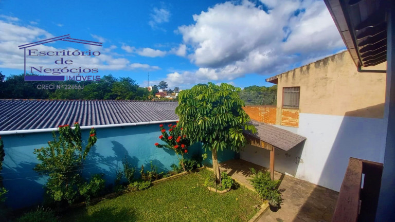 Imagem Casa com 4 Quartos à Venda, 260 m² em Vila Nova - Porto Alegre