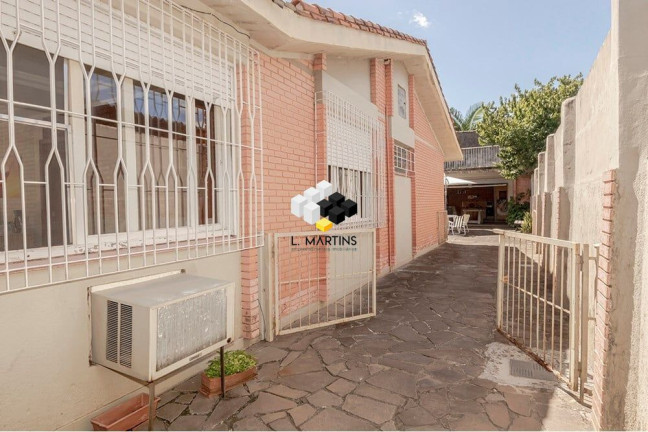 Imagem Casa com 4 Quartos à Venda, 381 m² em Camaquã - Porto Alegre Imagem Casa com 4 Quartos à Venda, 381 m² em Camaquã - Porto Alegre