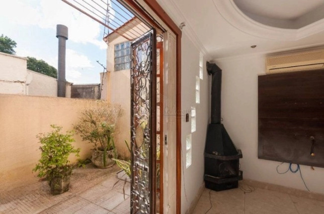 Imagem Casa com 3 Quartos à Venda, 167 m² em Sétimo Céu - Porto Alegre Imagem Casa com 3 Quartos à Venda, 167 m² em Sétimo Céu - Porto Alegre