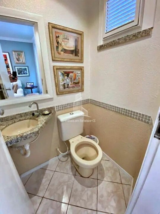 Imagem Casa com 4 Quartos à Venda, 155 m² em Engenheiro Luciano Cavalcante - Fortaleza