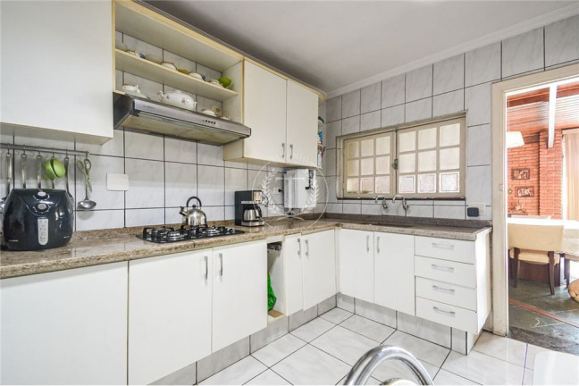 Imagem Casa com 4 Quartos à Venda, 144 m² em Campo Belo - São Paulo