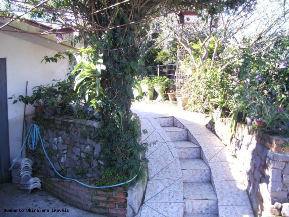 Imagem Casa com 5 Quartos à Venda, 216 m² em Pé De Plátano - Santa Maria