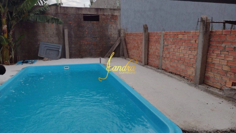 Imagem Casa com 2 Quartos para Alugar ou Temporada, 52 m² em Capão Novo - Capão Da Canoa