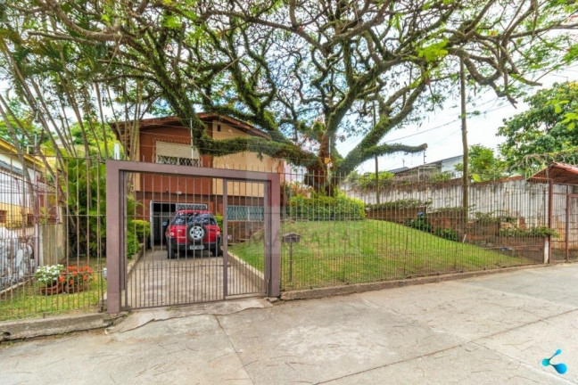 Imagem Casa com 4 Quartos à Venda, 181 m² em Santa Tereza - Porto Alegre