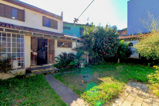 Imagem Imóvel com 3 Quartos à Venda,  em Cavalhada - Porto Alegre