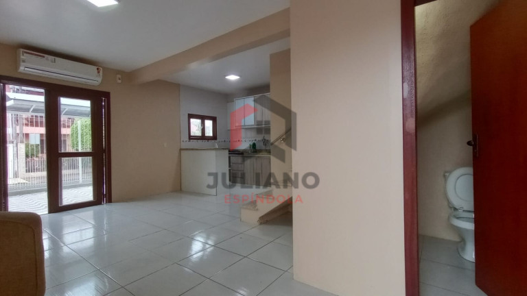 Imagem Casa com 2 Quartos à Venda, 75 m² em Hípica - Porto Alegre