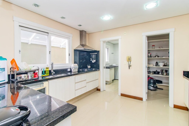Imagem Casa de Condomínio com 4 Quartos à Venda, 387 m²