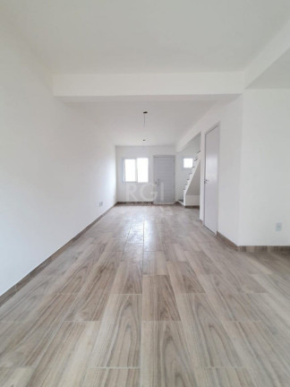 Imagem Casa de Condomínio com 2 Quartos à Venda, 64 m² em Vila Nova - Porto Alegre