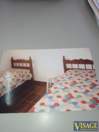 Imagem Apartamento com 2 Quartos à Venda,  em Jardim Golfinhos - Caraguatatuba