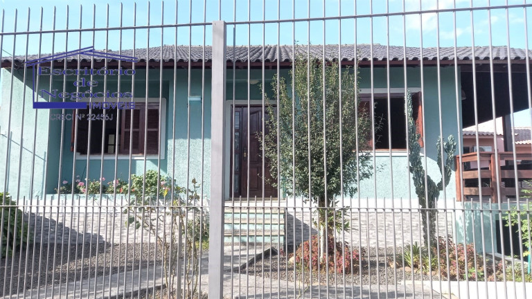 Imagem Casa com 4 Quartos à Venda, 260 m² em Vila Nova - Porto Alegre