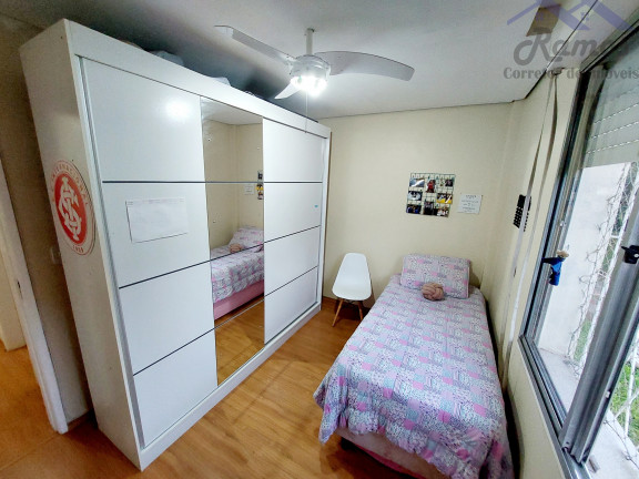 Imagem Imóvel com 3 Quartos à Venda, 62 m² em Vila Nova - Porto Alegre