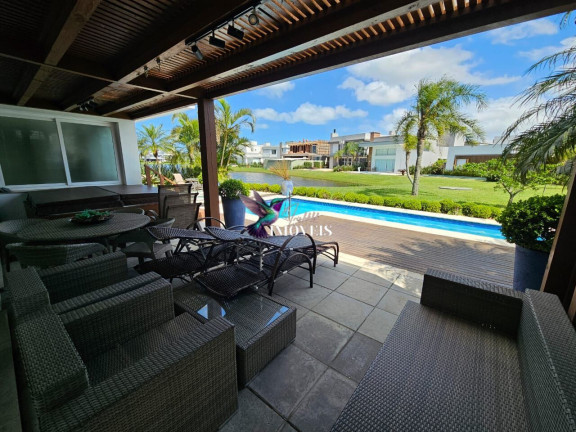 Imagem Casa de Condomínio com 4 Quartos à Venda, 327 m² em Centro - Xangri-lá