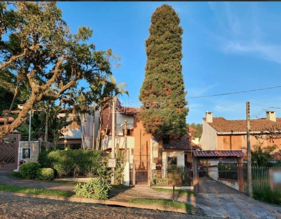 Imagem Sobrado com 3 Quartos à Venda, 209 m² em Ipanema - Porto Alegre