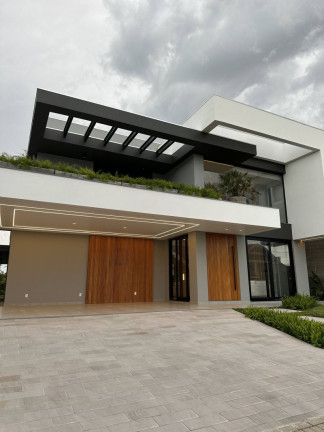 Imagem Casa de Condomínio com 5 Quartos à Venda, 454 m² em Centro - Capão Da Canoa
