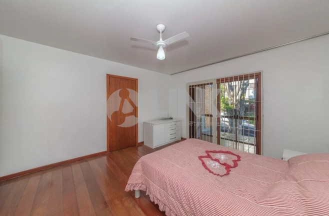 Imagem Casa com 3 Quartos à Venda, 262 m² em Auxiliadora - Porto Alegre Imagem Casa com 3 Quartos à Venda, 262 m² em Auxiliadora - Porto Alegre