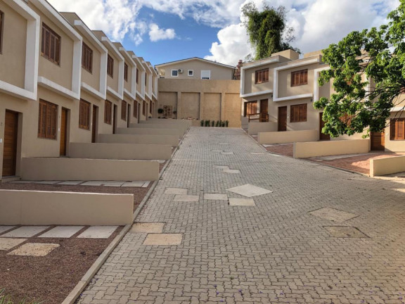 Imagem Casa de Condomínio com 2 Quartos à Venda, 106 m² em Teresópolis - Porto Alegre