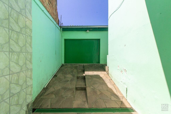 Imagem Casa com 3 Quartos à Venda, 216 m² em Vila Nova - Porto Alegre