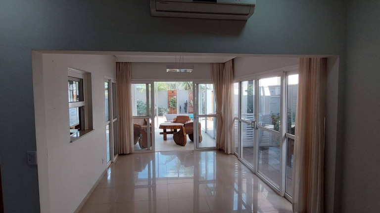 Imagem Casa com 4 Quartos à Venda, 375 m² em Condomínio Belvedere - Cuiabá