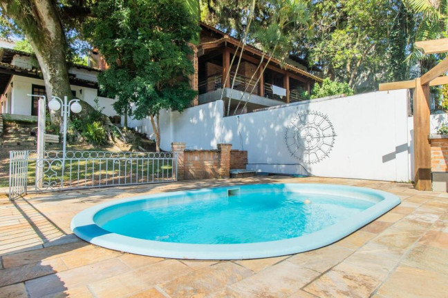 Imagem Casa com 4 Quartos à Venda, 348 m² em Ipanema - Porto Alegre