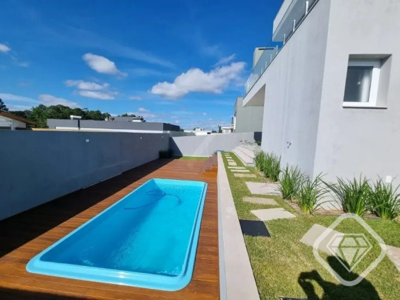 Imagem Casa de Condomínio com 4 Quartos à Venda,  em Vila Nova - Porto Alegre