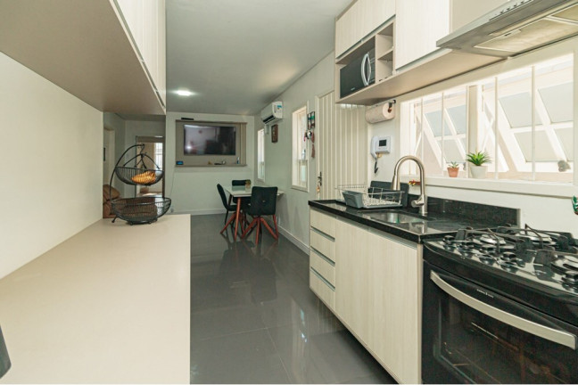 Imagem Casa com 3 Quartos à Venda, 170 m² em Passo Da Areia - Porto Alegre Imagem Casa com 3 Quartos à Venda, 170 m² em Passo Da Areia - Porto Alegre