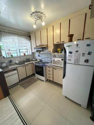 Imagem Casa com 3 Quartos à Venda, 244 m² em Cavalhada - Porto Alegre