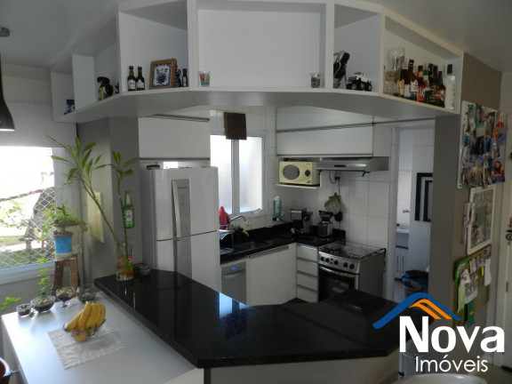 Imagem Imóvel com 2 Quartos à Venda, 70 m² em Auxiliadora - Porto Alegre