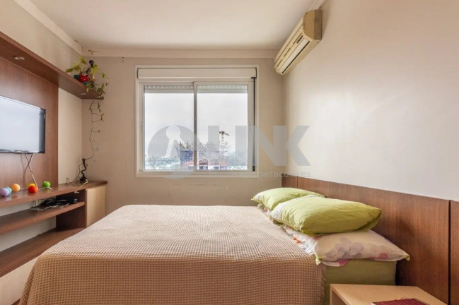 Imagem Apartamento com 2 Quartos à Venda, 70 m² em Passo Da Areia - Porto Alegre