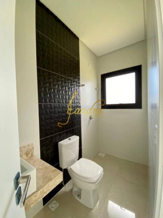 Imagem Casa de Condomínio com 4 Quartos à Venda, 180 m² em Rainha Do Mar - Xangri-la