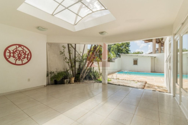 Imagem Casa com 4 Quartos à Venda, 250 m² em Menino Deus - Porto Alegre