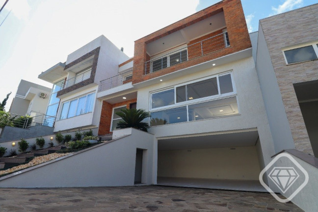 Imagem Casa de Condomínio com 3 Quartos à Venda,  em Hípica - Porto Alegre