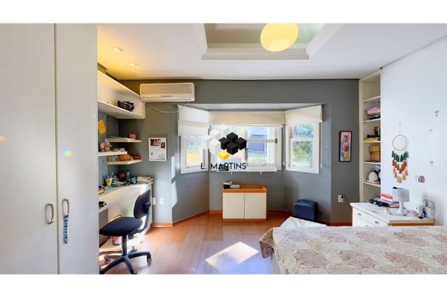 Imagem Casa com 4 Quartos à Venda, 394 m² em Vila Assunção - Porto Alegre