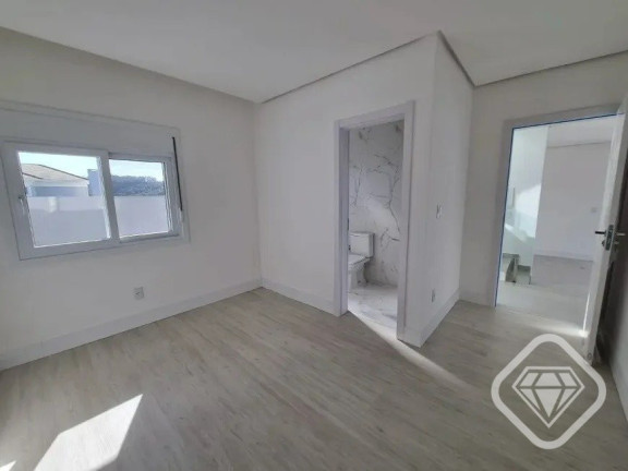 Imagem Casa de Condomínio com 4 Quartos à Venda,  em Vila Nova - Porto Alegre