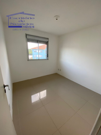 Imagem Imóvel com 2 Quartos à Venda, 47 m² em Vila Nova - Porto Alegre Imagem Imóvel com 2 Quartos à Venda, 47 m² em Vila Nova - Porto Alegre