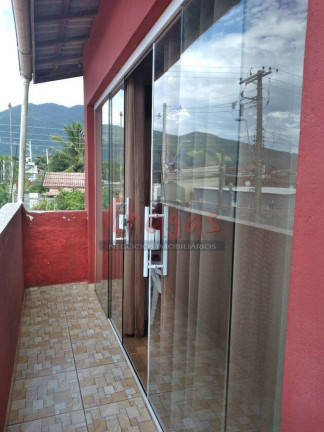 Imagem Casa com 3 Quartos à Venda, 180 m² em Jaraguá - Caraguatatuba