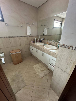 Imagem Casa de Condomínio com 4 Quartos à Venda, 291 m² em Jardins Madri - Goiânia
