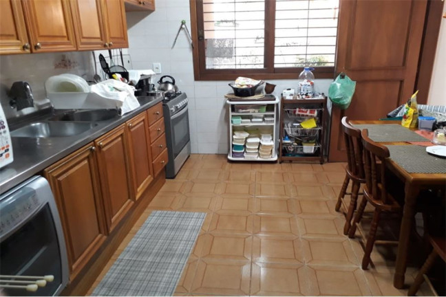 Imagem Casa de Condomínio com 4 Quartos à Venda, 195 m² em Teresópolis - Porto Alegre