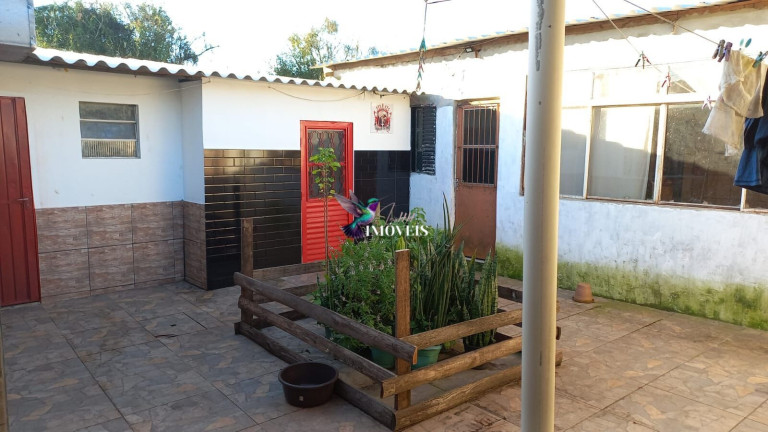 Imagem Casa com 2 Quartos à Venda, 300 m² em Tijuca - Alvorada