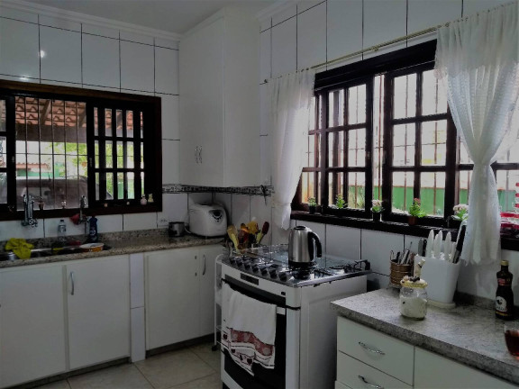 Imagem Sobrado com 5 Quartos à Venda, 180 m² em Massaguaçu - Caraguatatuba