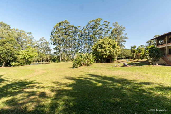 Imagem Sobrado com 3 Quartos à Venda, 16.384 m² em Campo Novo - Porto Alegre