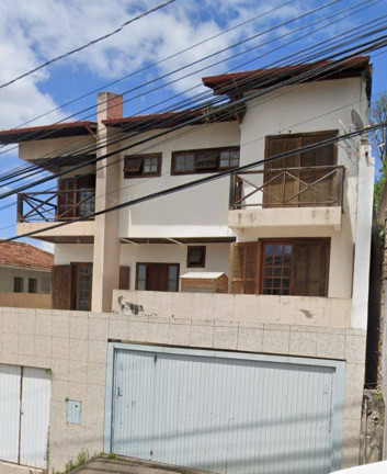 Imagem Casa à Venda, em Estreito - Florianópolis Imagem Casa à Venda, em Estreito - Florianópolis