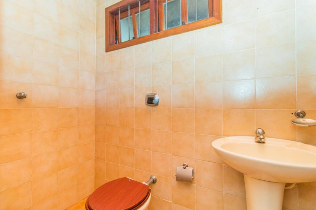 Imagem Casa com 4 Quartos à Venda, 348 m² em Ipanema - Porto Alegre