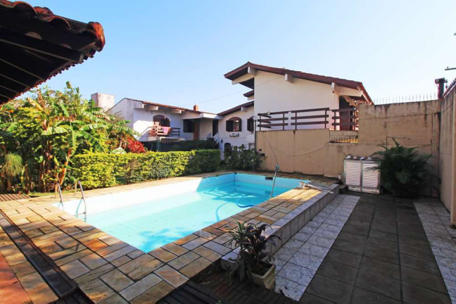Imagem Casa com 4 Quartos à Venda, 458 m² em Partenon - Porto Alegre Imagem Casa com 4 Quartos à Venda, 458 m² em Partenon - Porto Alegre