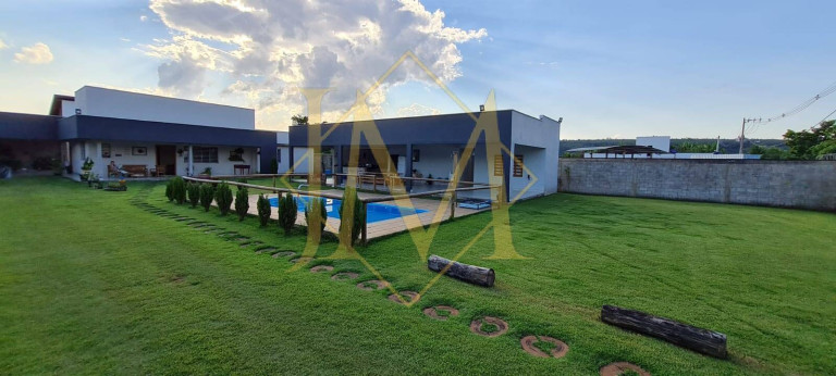 Imagem Chácara com 4 Quartos à Venda, 1.500 m² em Caratinga