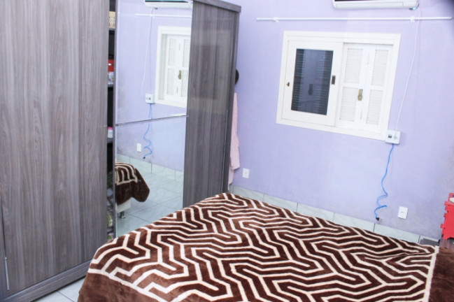 Imagem Casa com 3 Quartos à Venda, 250 m² em Mathias Velho - Canoas