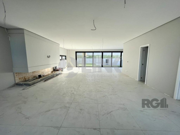 Imagem Imóvel com 4 Quartos à Venda, 371 m² em Vila Nova - Porto Alegre