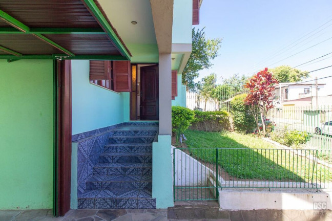Imagem Casa com 3 Quartos à Venda, 216 m² em Vila Nova - Porto Alegre