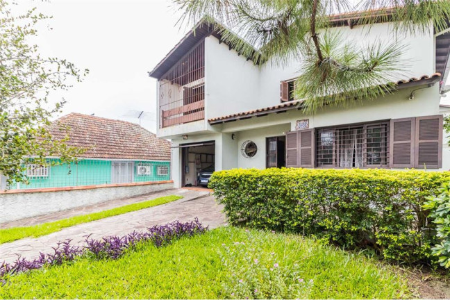 Casa com 4 Quartos à Venda, 313 m² em Cavalhada - Porto Alegre