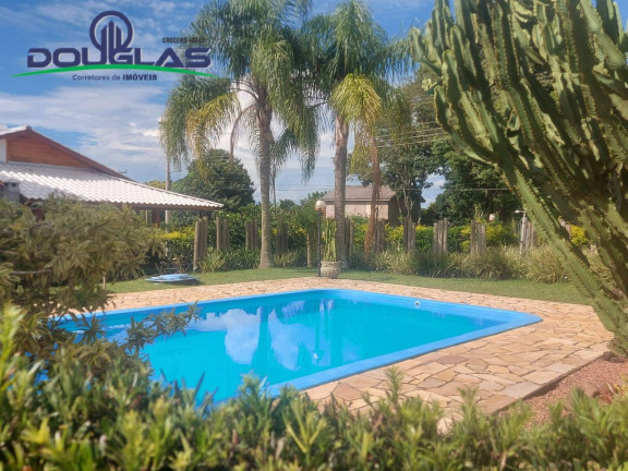 Imagem Casa com 5 Quartos à Venda, em águas Claras - Viamão Imagem Casa com 5 Quartos à Venda, em águas Claras - Viamão